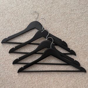 Set of Black Wooden Hangers
